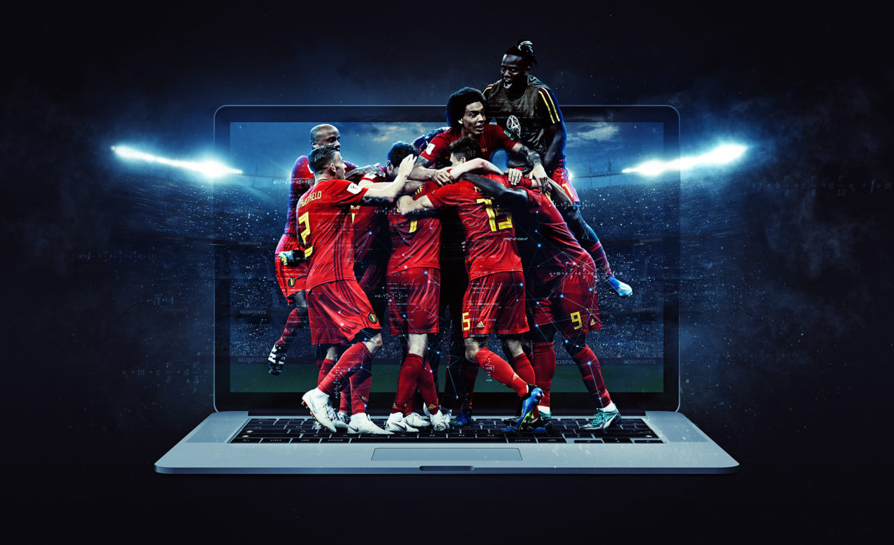 Visualisation of Belgian football players celebrating in front of a laptop and a stadium at night in the background