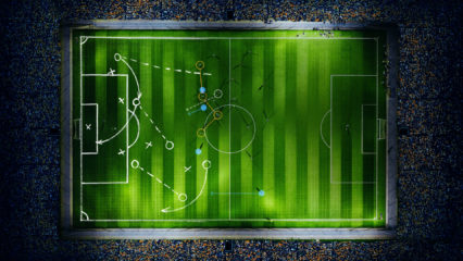 Visualisation of a football stadium at night from above with tactical instructions on the field